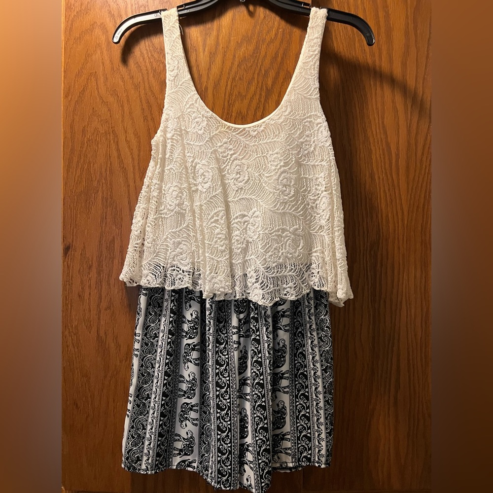 White lace (on top) Romper with silky black/white bottom. Polyester material